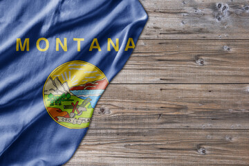 United States country state Montana on old wooden pattern table board