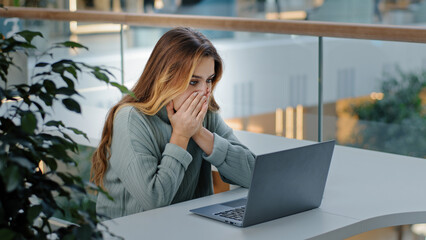 Caucasian stressful business woman with laptop frelancer girl frustrated shocked reading bad online...