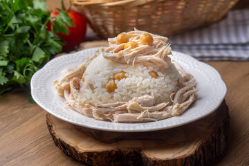Traditional delicious Turkish food; Rice with chickpeas and chicken (Turkish name; Tavuklu nohutlu pilav or pilaf)