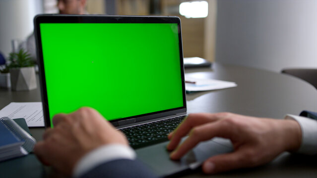 Business man using touchpad laptop green screen on corporate team conference. - Powered by Adobe