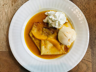 Dish of Crepe Suzette with Vanilla Ice Cream in Thailand.