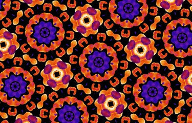 Abstract kaleidoscope background. Beautiful multicolor kaleidoscope texture. Unique kaleidoscope design in red and orange colors on a black background.