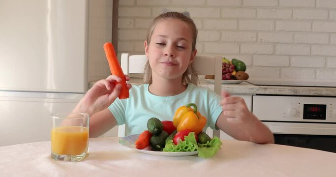 little girl wants to eat vegetables and fruits. the child enjoys fresh fruits and vegetables. girl showing thumbs up. copy space