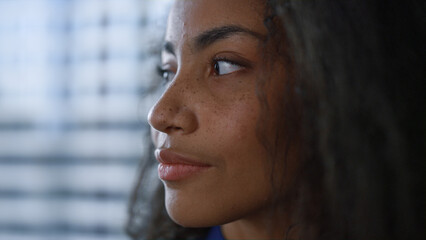 Young black hair woman looking thinking about business career in window office