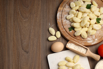 Concept of cooking with raw potato gnocchi, space for text