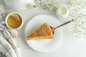 Concept of tasty dessert with honey cake, top view