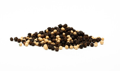 White pepper and black pepper close-up as a background. Spices of Cambodia. Seasoning for dishes. Additive ingredient for the preparation of delicious delicacies. Sauce set