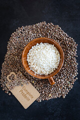 Rice and lentils on a dark background. Complete protein sources. Complete vegan protein. Healthy food
