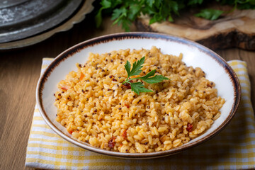 Bulgur pilaf with quinoa, food concept photo. Turkish name; kinoali bulgur pilavi