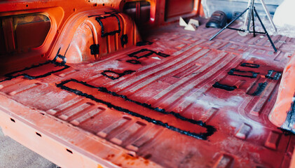 van truck body repair, sealing of welded seams.