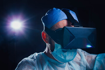 male doctor medic in vr glasses helmet, trained in virtual reality 3d
