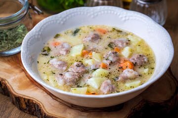 Seasoned soup with meatballs with vegetables. English name; sulu kofte, eksili kofte, terbiyeli kofte)