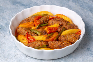 Traditional Homemade Turkish Food Kofte - Kofta with Tomato Sauce and Potatoes. (Turkish name; Izmir kofte)