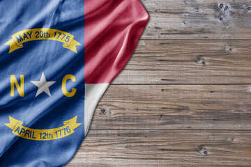 United States country state North Carolina on old wooden pattern table board