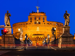 Naklejka na ściany i meble Exterior of Castel Sant'Angelo during blue hour in the early morning (Rome, Italy)