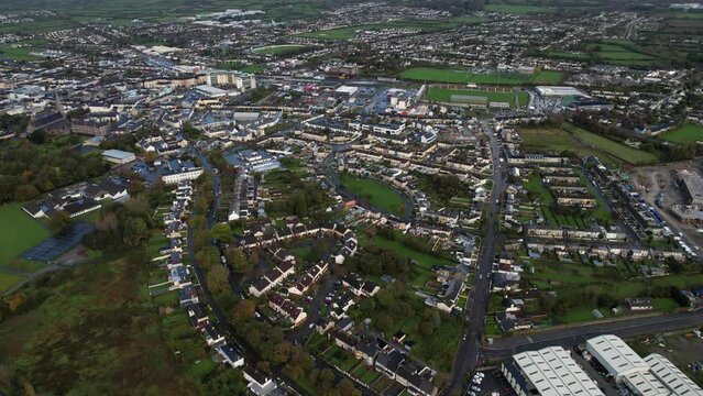 Tralee, County Kerry, Ireland, Establishing Drone Aerial View of Cityscape and Green Landscape on Cloudy Autumn Day