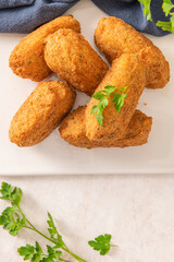 Bolinhos de bacalhau, very famous in Portuguese gastronomy. Fried dumpling, cod dumpling, fish meat, salted cod fritters, bacalao bunuelos.