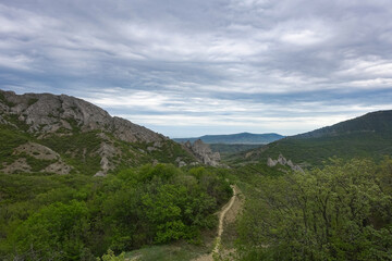 View of the road in the gorge of the Echki-Daga mountain. Picturesque view of the Crimean mountains. Fox Bay. Crimea.