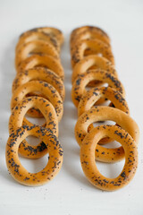 Dried bagels with poppy seeds on a white background