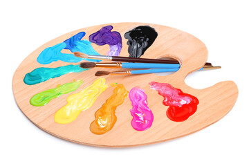 Palette with paints and brushes on white background. Artist equipment
