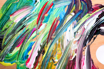 Abstract colorful acrylic paint as background, top view
