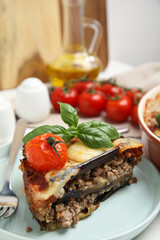 Plate of delicious eggplant lasagna on table
