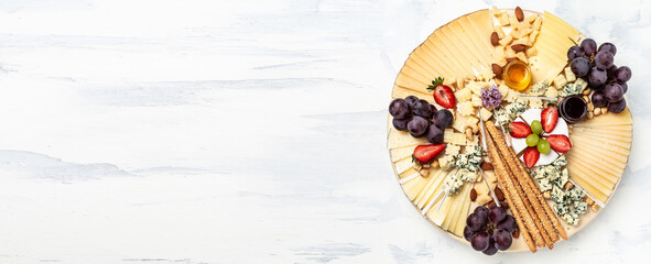 Antipasto platter, Antipasto Cheese board of various types of soft and hard cheese. spanish...