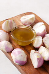 red inion water in a container on table close up 