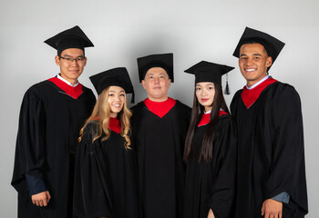 Group of graduate students friends pose together excitedly