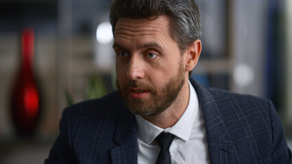 Fototapeta premium Confident businessman talking discussing work ideas in marketing company office.