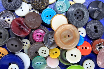 old vintage buttons on a blue background