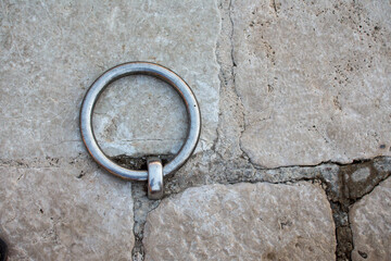 Huge Metal Ring for anchor boats and yachts near coastline. Iron ring for mooring boats on the pier...