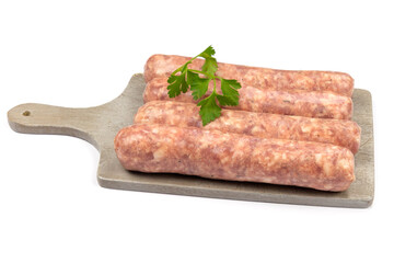 raw sausages on wooden board isolated on white background