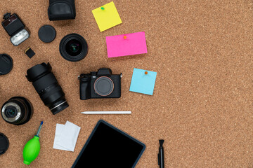 Cork board background with some photography objects
