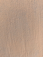 close up of beige plaster on wall