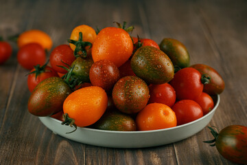 Cherry tomato - assorted multicolored tomatoes on table