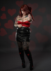 Beautiful large woman in red bra and mini skirt