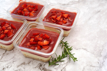 Strawberry cheese pie on marble table
