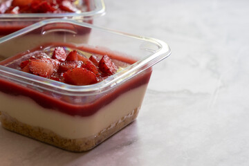 Strawberry cheese pie on marble table