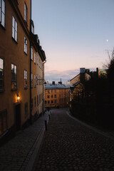 Traditional Swedish backstreet at sunset, on the island of Sodermalm, Stockholm city, Sweden.