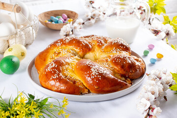 Traditional round Easter bread on a light background. Happy easter