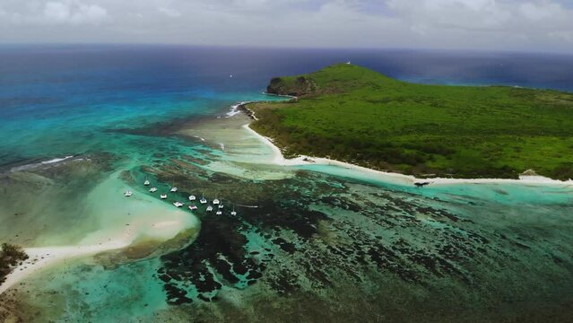 Aerial view on a bay with catamarans between Flat and Gabriel islands 