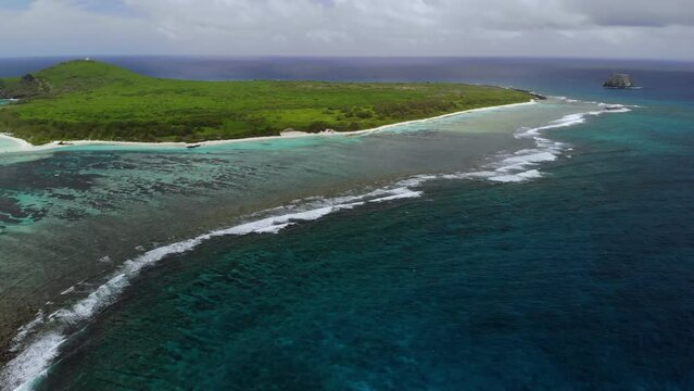 Aerial view on a bay with catamarans between Flat and Gabriel islands 