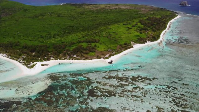 Aerial view on a bay with catamarans between Flat and Gabriel islands 