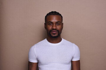 Studio portrait of young man wearing t-shirt