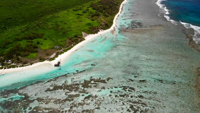 Aerial view on a bay with catamarans between Flat and Gabriel islands 