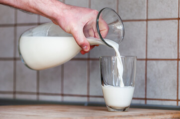 glass of milk from a jug