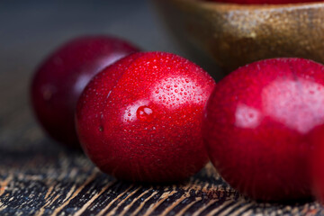harvested ripe sweet cherries of red color