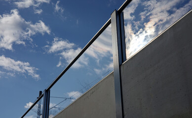 blue sky over concrete wall