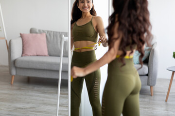 Happy young Indian woman measuring waist with tape near mirror at home, free space